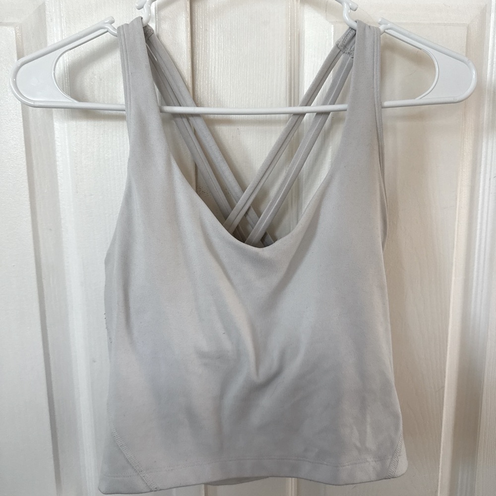 Cross back white activewear tank top